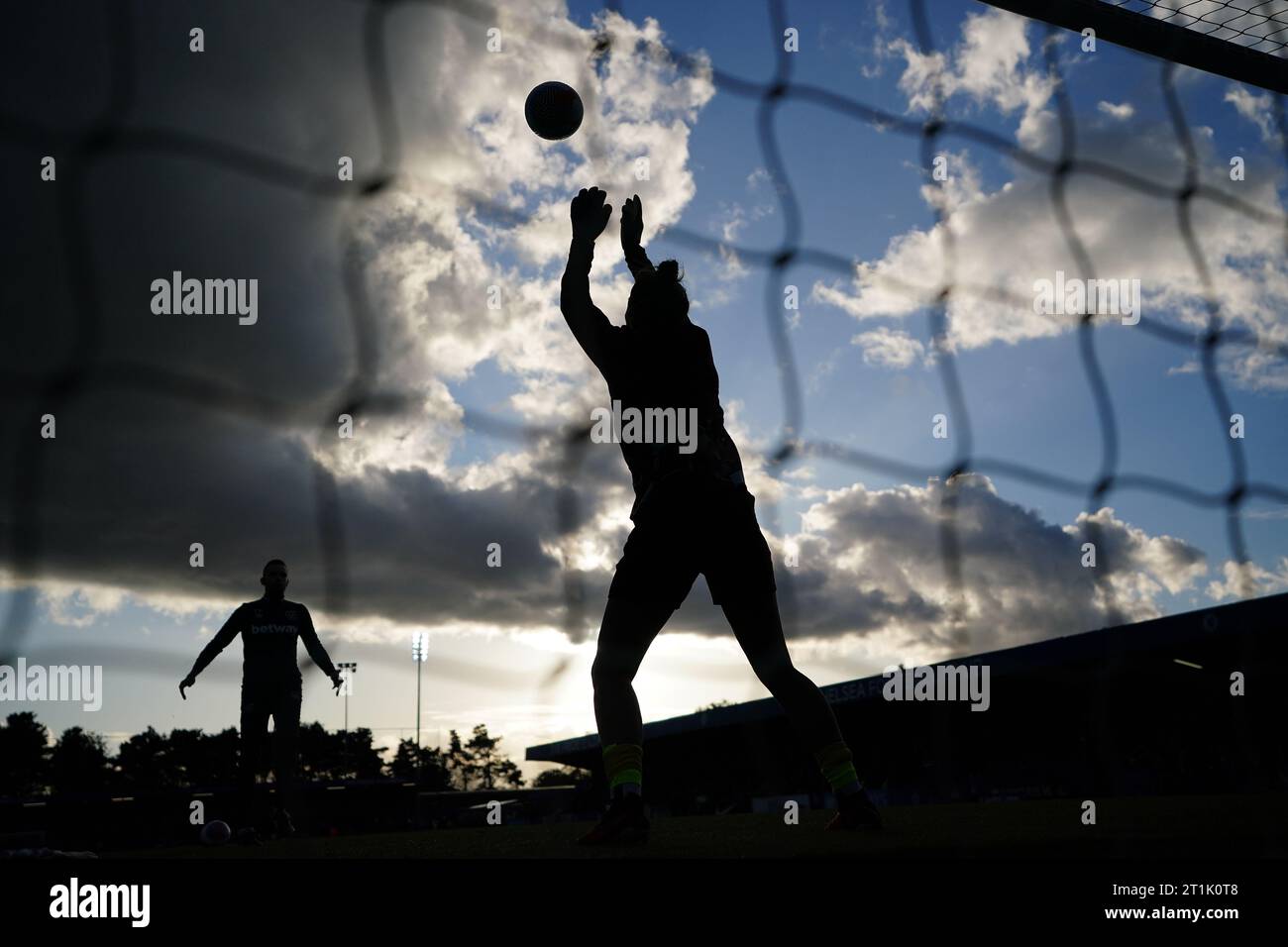 Goalkeepers warming up before the Barclays Women's Super League match at Kingsmeadow, London. Picture date: Saturday October 14, 2023. Stock Photo