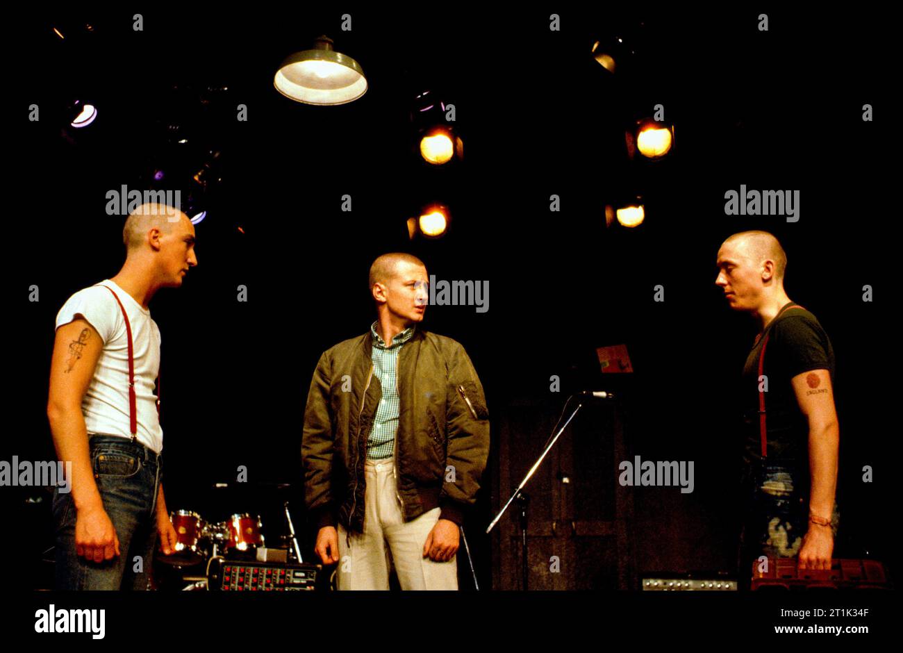 l-r: Dorian Healy (Landry), Peter Lovstrom (Swells), Robin Hayter (Napper) in OI FOR ENGLAND by Trevor Griffiths at the Theatre Upstairs, Royal Court Theatre, London SW1  08/06/1982  lyrics: Trevor Griffiths  music: Andy Roberts & the band  design: Chris Townsend  lighting: Robin Myerscough-Walker  musical director: Andy Roberts  director: Antonia Bird Stock Photo