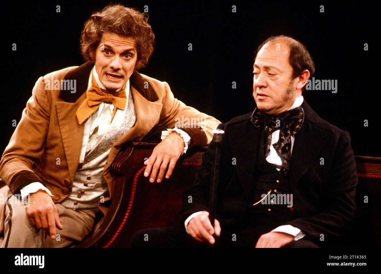 l-r: Paul Shelley (Alfred Evelyn), George Raistrick (Mr Graves) in MONEY by Edward Bulwer-Lytton at the Royal Shakespeare Company (RSC), The Pit, Barbican Centre, London EC2  29/05/1982  design: Di Seymour  lighting: Leo Leibovici & Wayne Dowdeswell  director: Bill Alexander Stock Photo