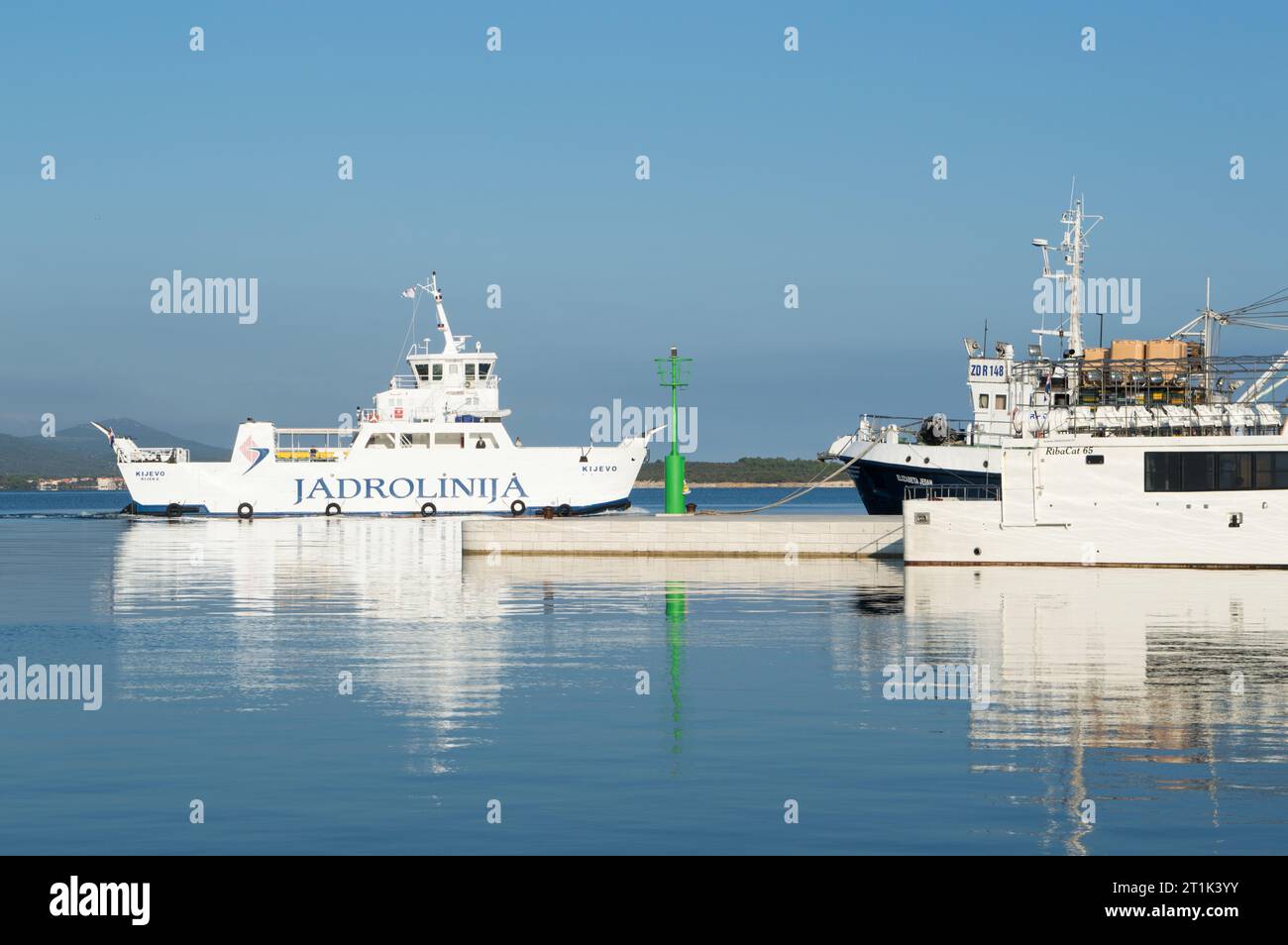 Biograd, Croatia - 10 Oct 2020: Passenger and car ferry ship arriving in Biograd, owned by Jadrolinija, Croatian shipping company Stock Photo