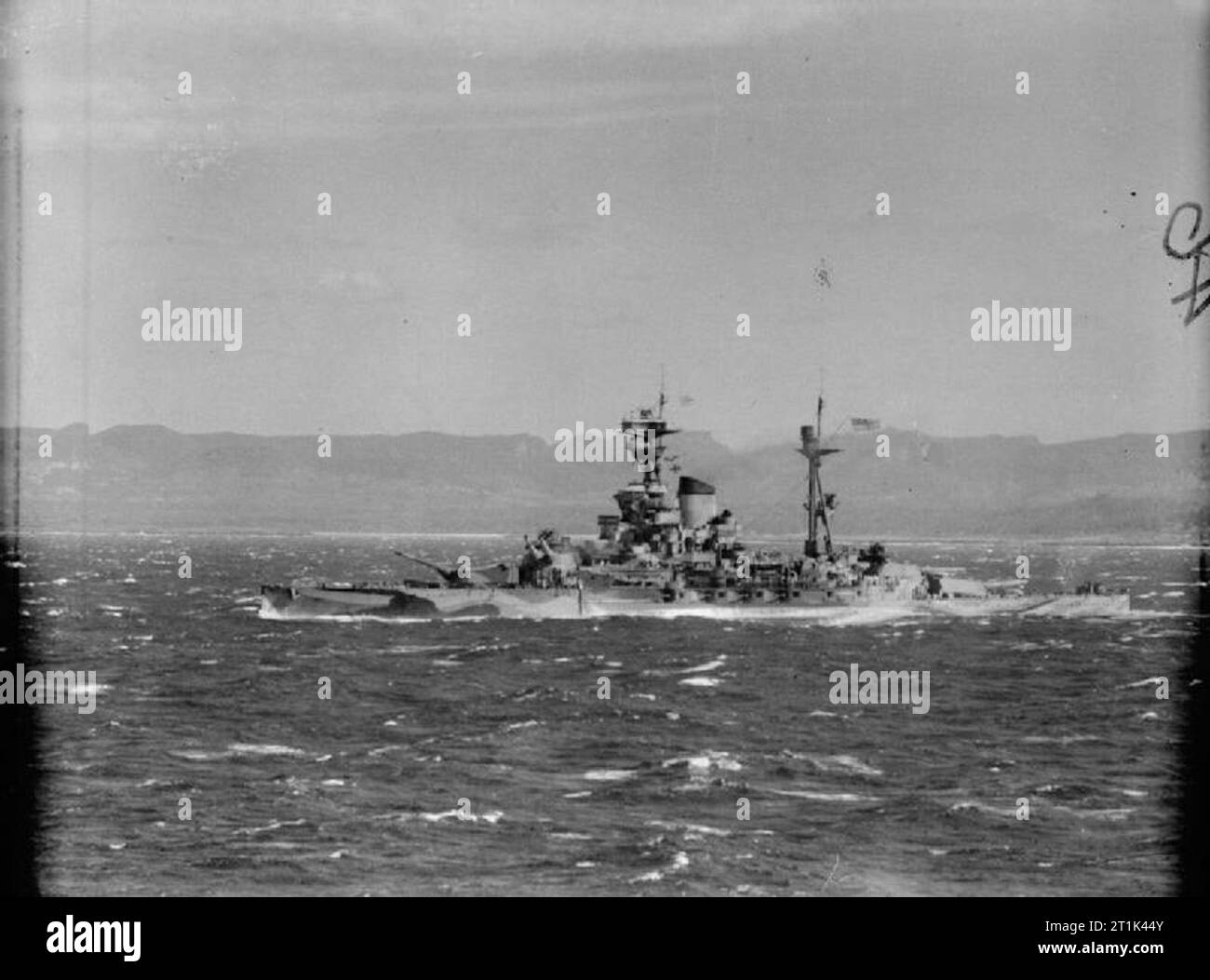 The Royal Navy during the Second World War At the end of Operation Ironclad, the Allied landings on Madagascar. As seen from the Dido Class cruiser HMS HERMIONE, HMS RAMILLIES about to enter French Bay Harbour, near Diego Suarez, Madagascar. Stock Photo