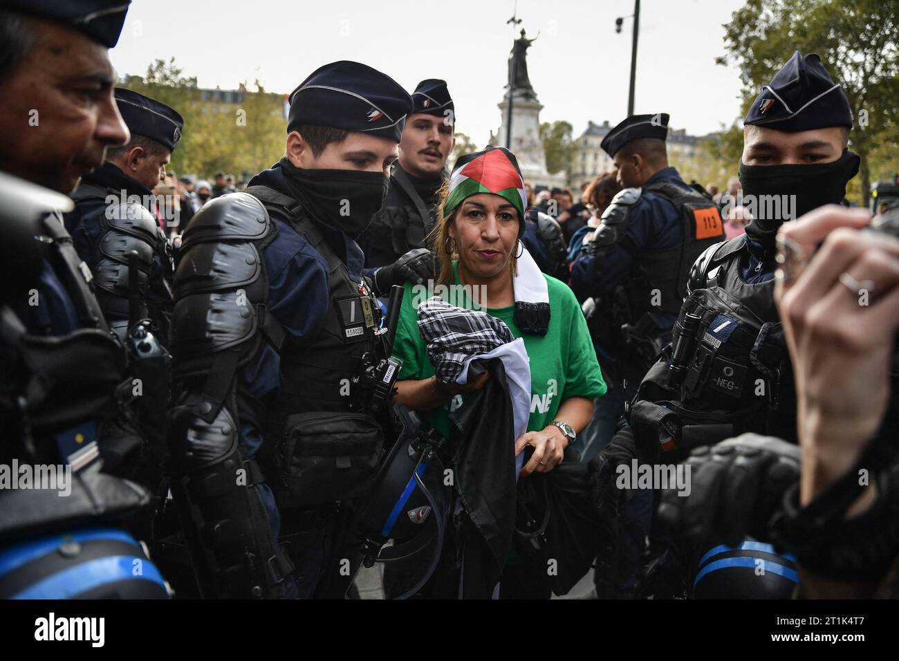 Paris, France. 14th Oct, 2023. Riot police arrest a protester during a ...