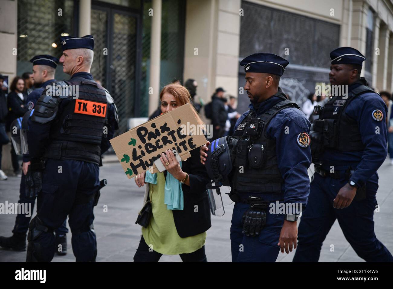 Paris, France. 14th Oct, 2023. Riot police arrest a protester during a ...