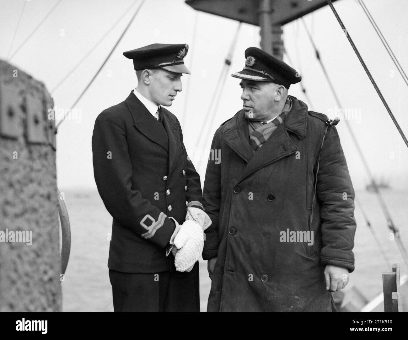 With a Rescue Ship. 19 To 22 February 1943, in the Clyde, Off Greenock, Showing Practice in Progress With the Ss Gothland, One of the Fleet Auxiliary Rescue Ships Which Sailed With Convoys When the U-boat War Was at Its Height. Right to left: Captain John Hadden with Surgeon Lieutenant J McKenzie, RNVR, the ship's doctor. Stock Photo