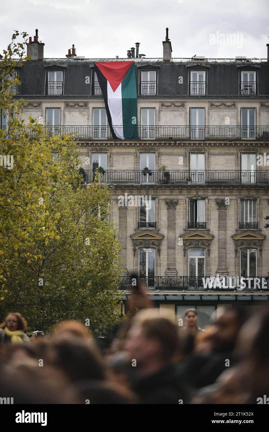 Paris, France. 14th Oct, 2023. A huge Palestinian flag is hanged on a ...