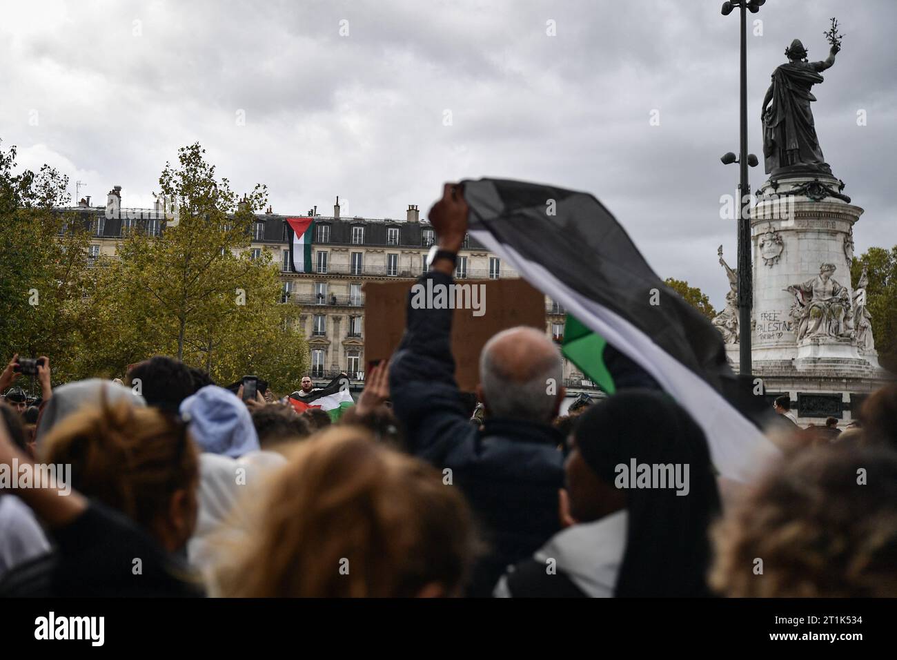 Paris, France. 14th Oct, 2023. A huge Palestinian flag is hanged on a ...