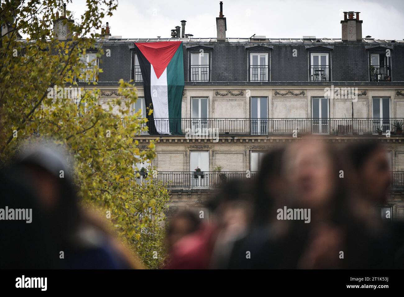 Paris, France. 14th Oct, 2023. A huge Palestinian flag is hanged on a ...