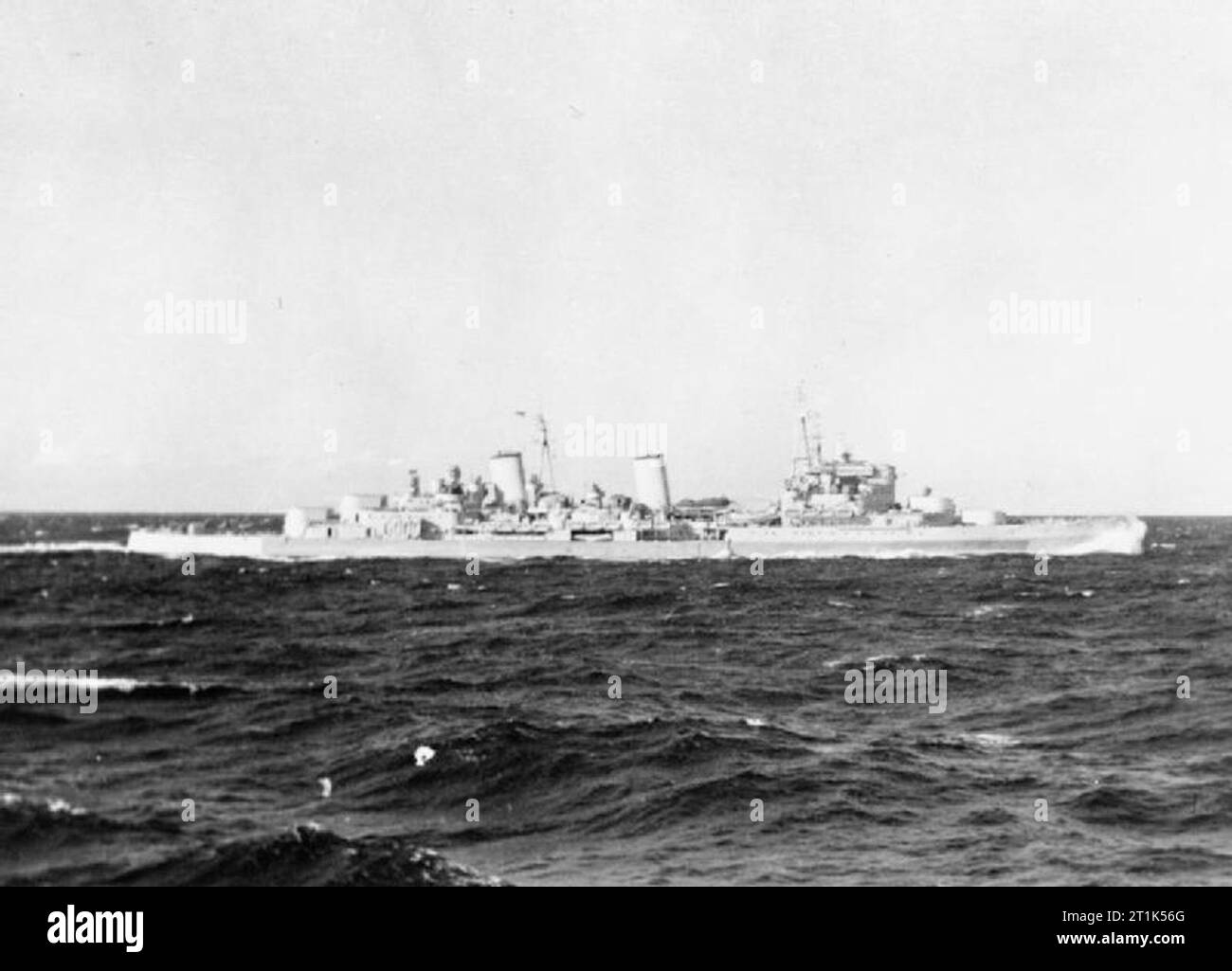 HMS Belfast during the Second World War British Pacific Fleet 1945: HMS BELFAST photographed in the South Atlantic from HMS BERWICK. Stock Photo