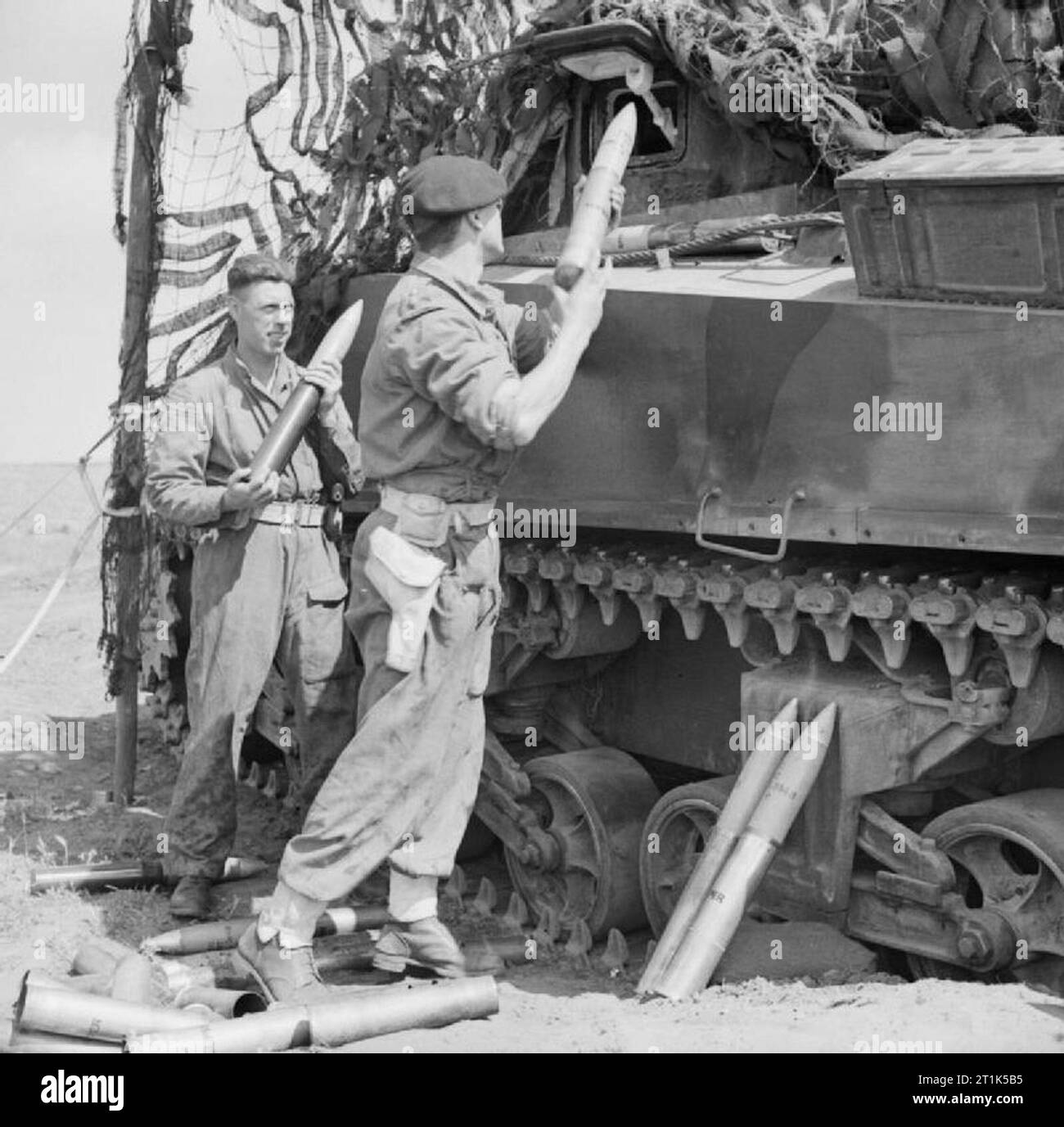 Shells being loaded into a Sherman tank in the Anzio bridgehead, Italy