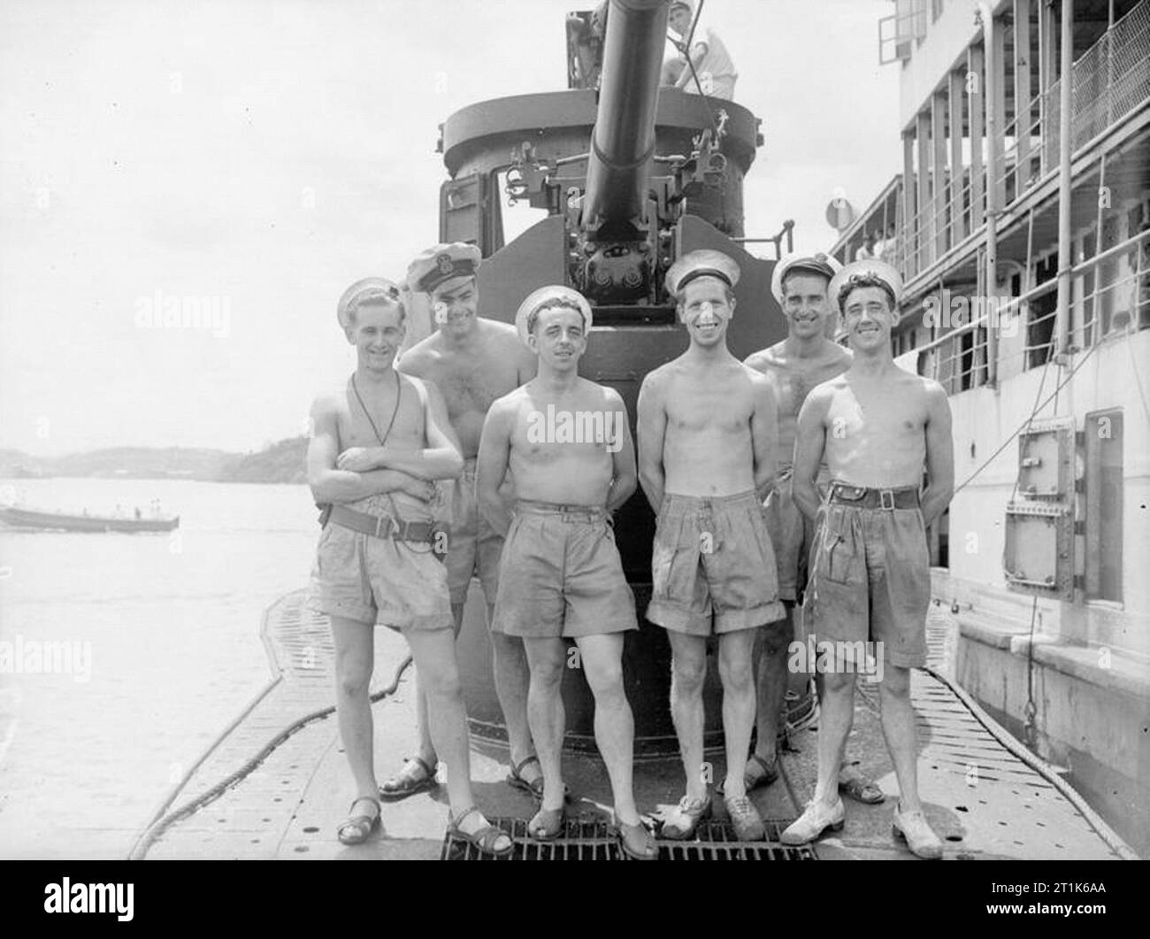 Officers and Men of HMS/M Trident. 27 July 1945. Officers and men of HMS TRIDENT, Left to right: back row: Chief Petty Officer P H Redman, Little Hampton, Sussex; Petty Officer G King, Bognor Regis. Front row: Able Seaman N M Shaw, Gosport, Hants; Petty Officer W Curtis, Ashford, Kent; Leading Stoker T Buddy, Gosport; Leading Telegraphist W Adams, Gosport. Stock Photo