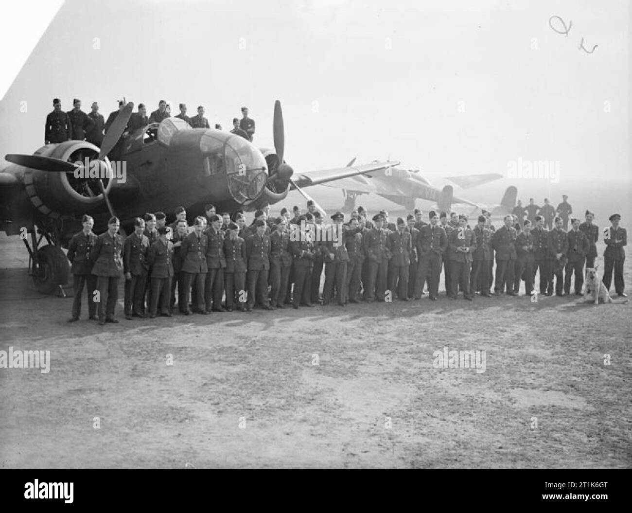 Royal Air Force 1939-1945- Bomber Command Crews and Hampden aircraft of No 50 Squadron at Waddington after the raid on shipping off Bergen, 9 April 1940. Stock Photo