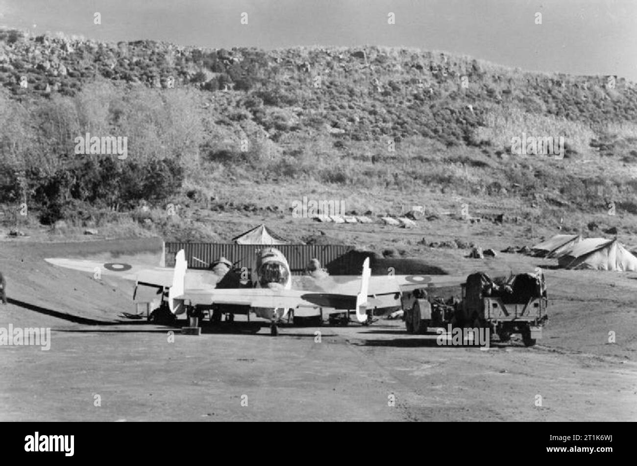 Royal Air Force Coastal Command- No. 247 Group Operations in the Azores, 1943-1945. A Lockheed Hudson Mark III of No. 233 Squadron RAF Detachment, undergoes servicing in a dispersal at Lagens. Stock Photo