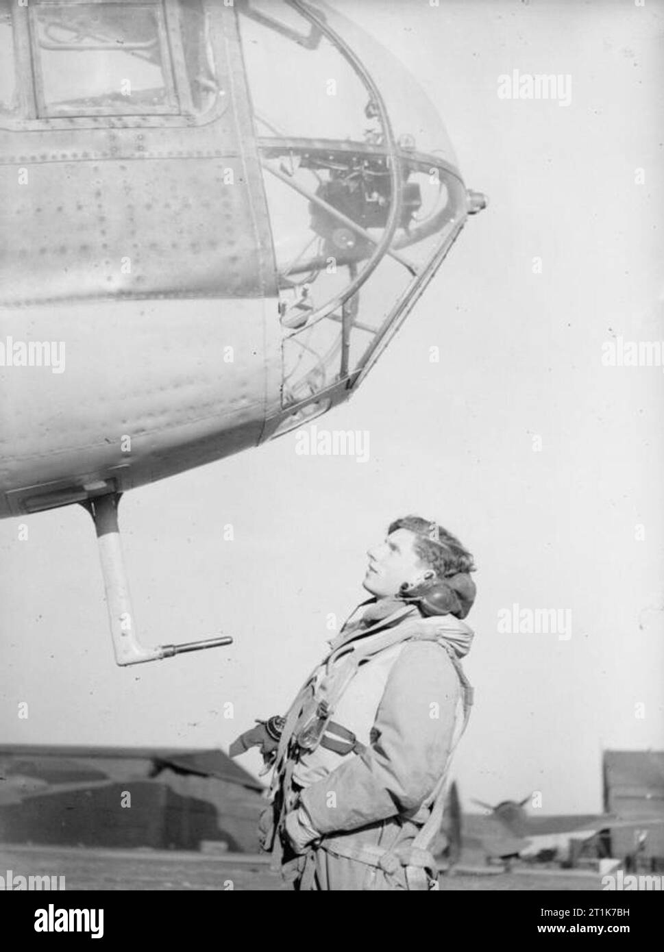 Royal Air Force 1939-1945- Bomber Command A student observer contemplates his 'office' in the nose of a Hampden before embarking on an early-morning flight at No 5 Air Observers School at Jurby on the Isle of Man, January 1942. Stock Photo