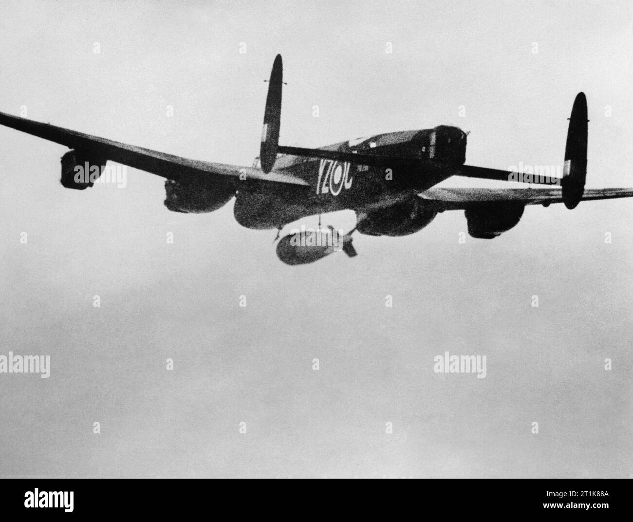 Royal Air Force Bomber Command, 1942-1945. Avro Lancaster B Mark I (Special), PB996 'YZ-C', of No. 617 Squadron RAF, flown by Flying Officer P Martin and crew, releasing a 22,000-lb MC deep-penetration bomb (Bomber Command executive codeword 'Grand Slam') over the viaduct at Arnsberg, Germany. Stock Photo