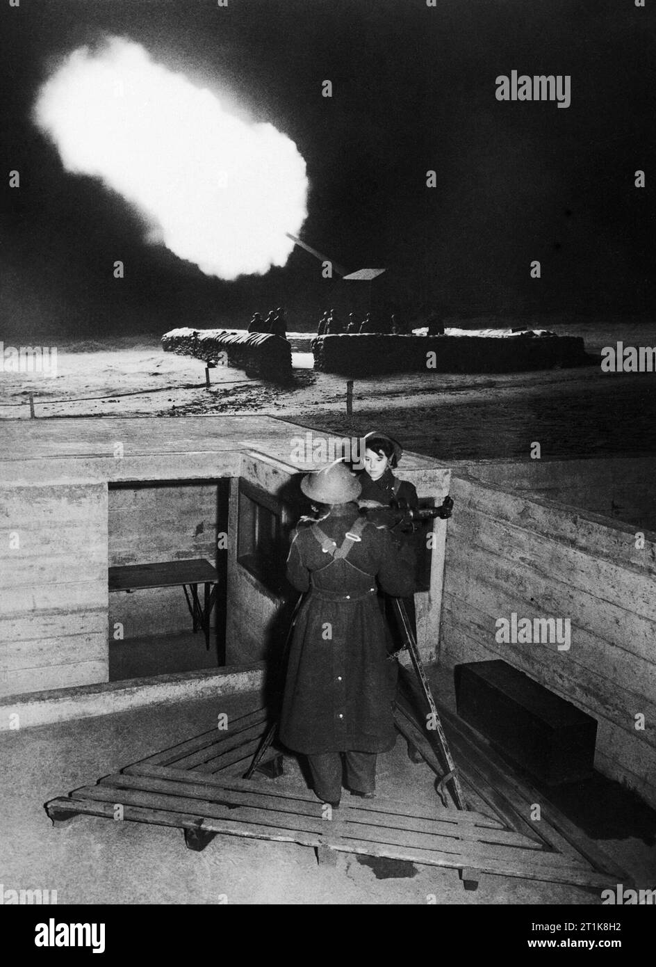 The Auxiliary Territorial Service in the United Kingdom 1939-1945 Auxiliary Territorial Service (ATS) girls operate ranging equipment for a battery of 4.5in guns during a night shoot at Tycroes anti-aircraft training camp on Anglesey in Wales. Stock Photo