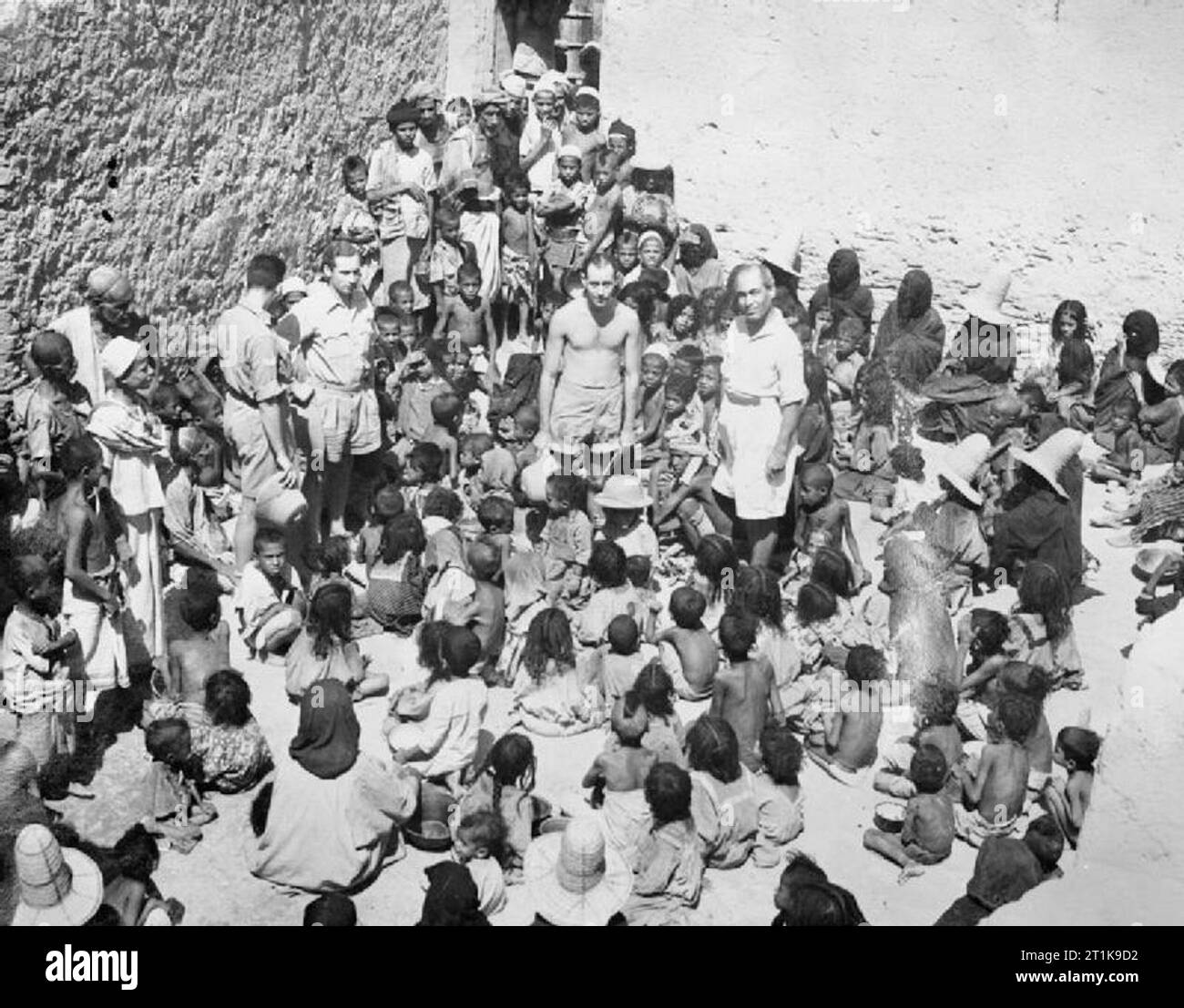Royal Air Force in the Middle East, 1944-1945. Children wait outside a