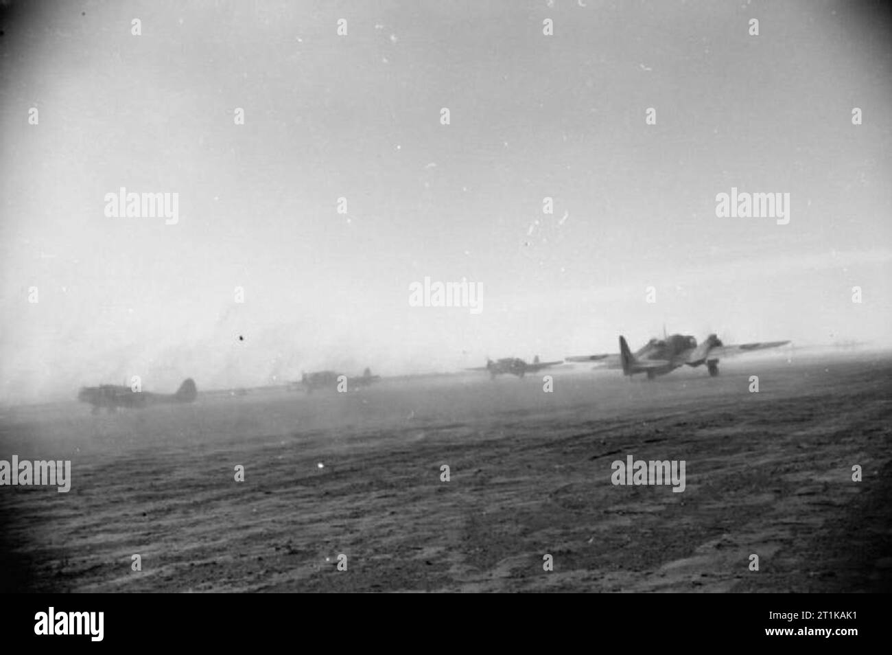 Royal Air Force Operations in the Middle East and North Africa, 1939-1943. A Martin Baltimore Mark IIIA of No. 55 Squadron RAF (right), takes off from Ben Gardane North, Tunisia, for an attack on Mareth village, as other aircraft of the Squadron taxi to the take off point Stock Photo