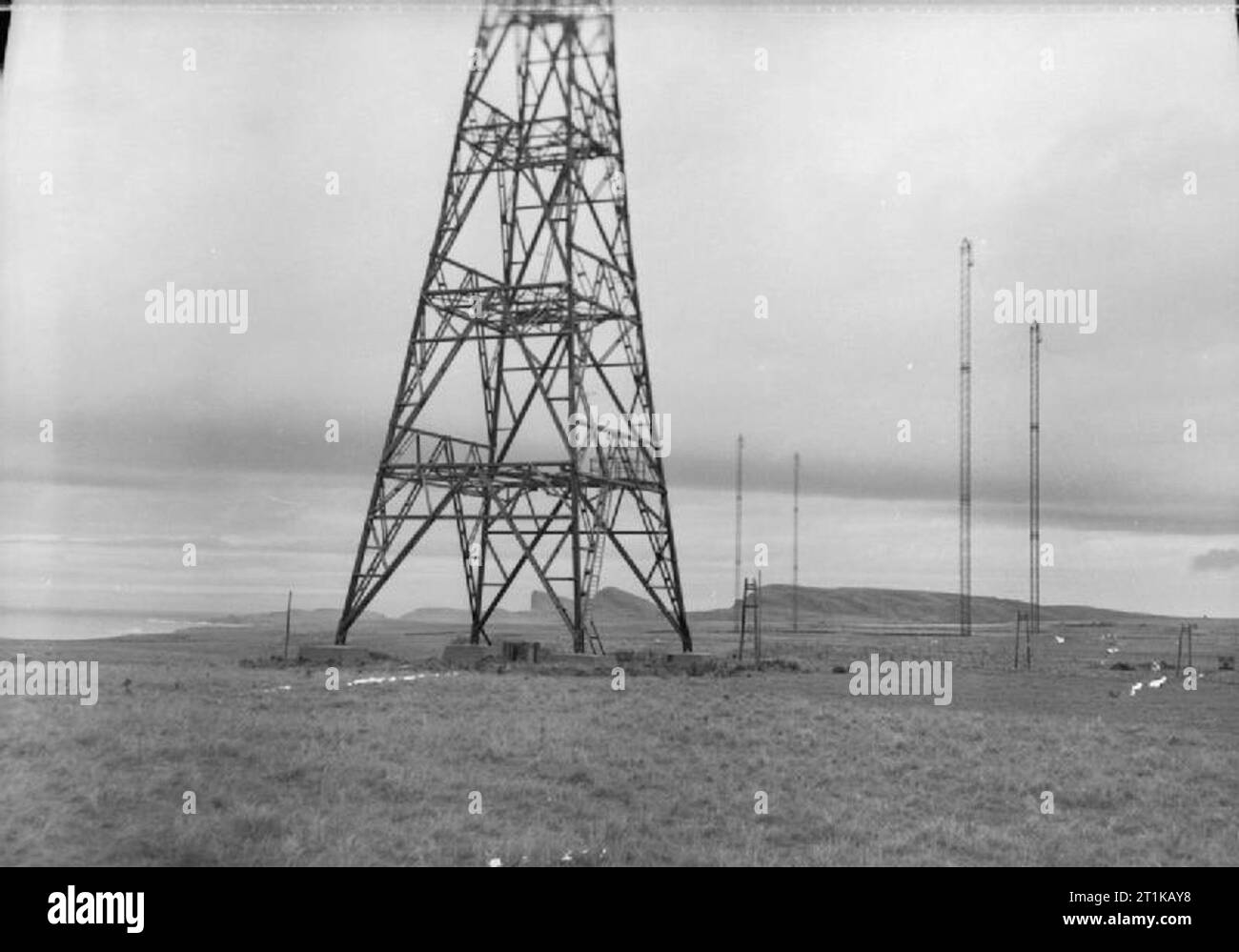 Royal Air Force Radar, 1939-1945 Chain Home: AMES Type 1 CH West Coast installation at Saligo Bay, Islay, Inner Hebrides. In the foreground is one of the 240ft wooden receiver towers, and, in the background, two pairs of 325ft guyed steel masts from which the transmitter aerials were suspended. Stock Photo