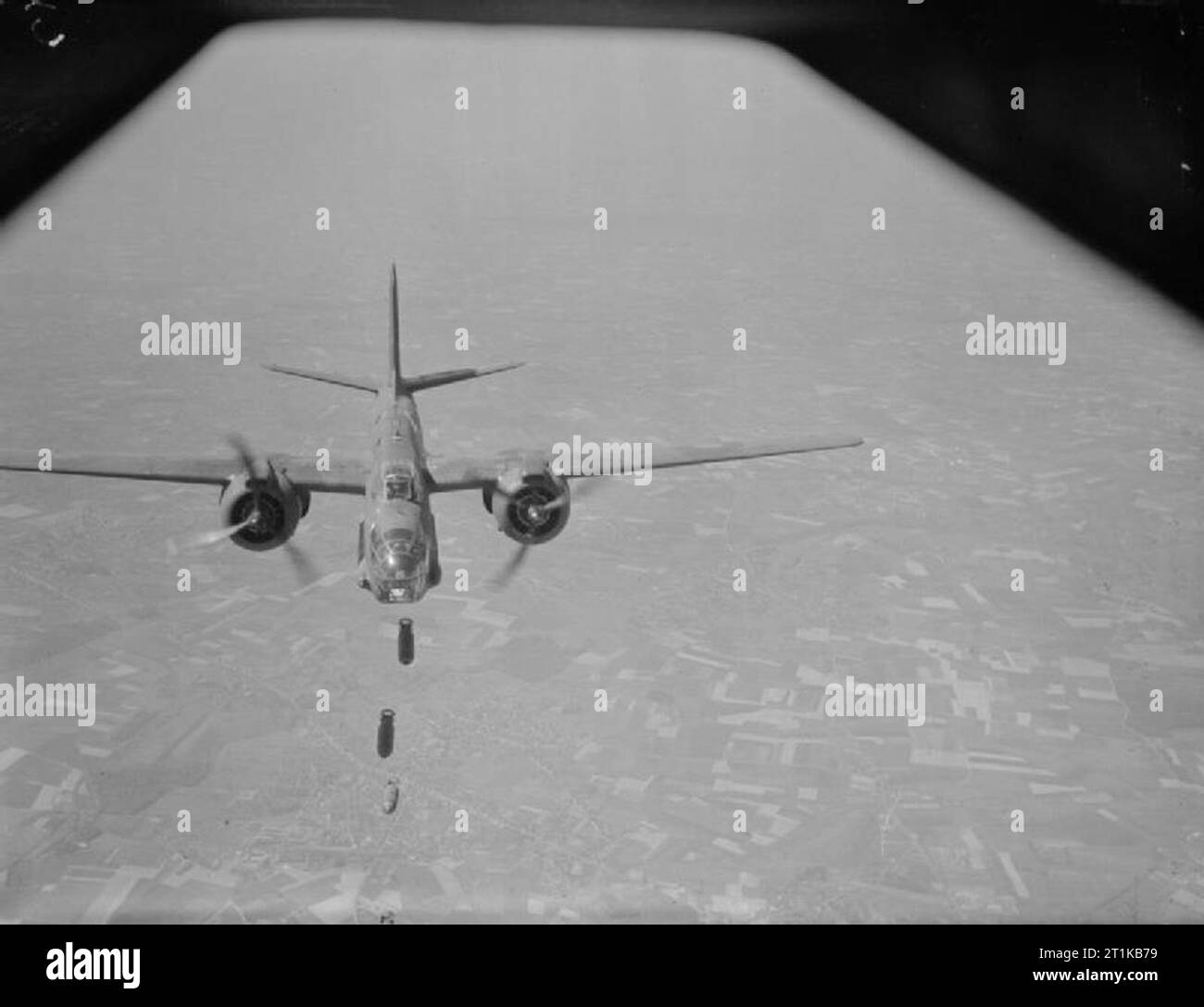 Royal Air Force- 2nd Tactical Air Force, 1943-1945. Douglas Boston Mark III, 'C for Charlie', of No. 88 Squadron RAF drops its bombs over the target during a daylight raid by aircraft of No. 2 Group on the engine sheds at Charleroi, Belgium. Stock Photo