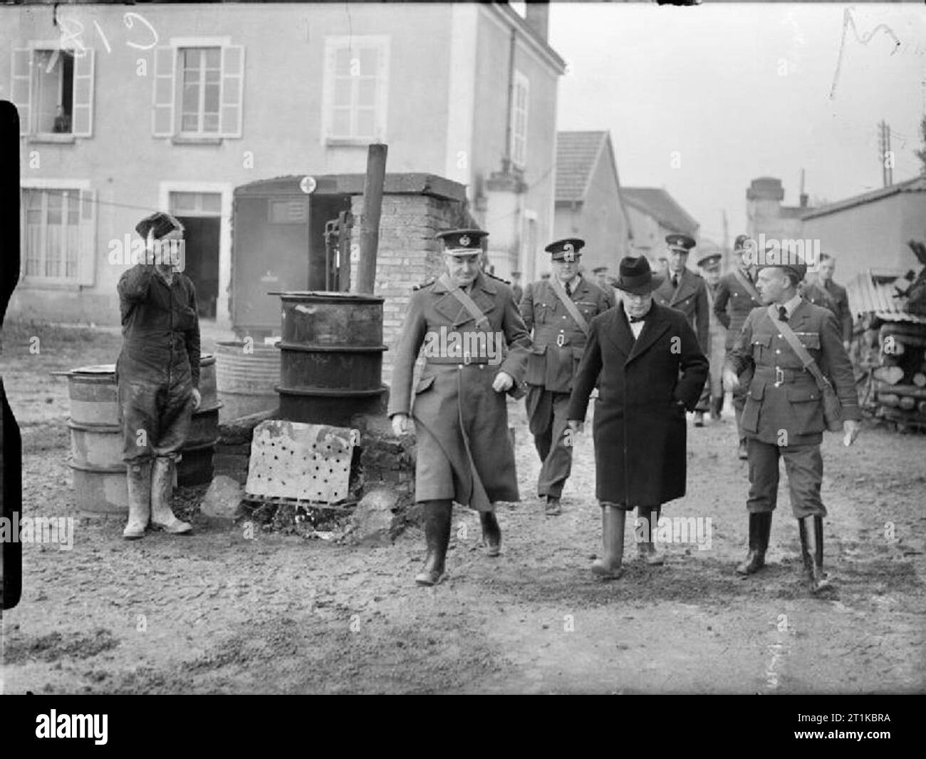 Royal Air Force- France 1939-1940. Sir Kingsley Wood, Secretary of State for Air, accompanied by Air Vice-Marshal P H L Playfair, Air Officer Commanding the Advanced Air Striking Force (left) , passes the boiler and bath quarters of an RAF unit billetted in France. Stock Photo