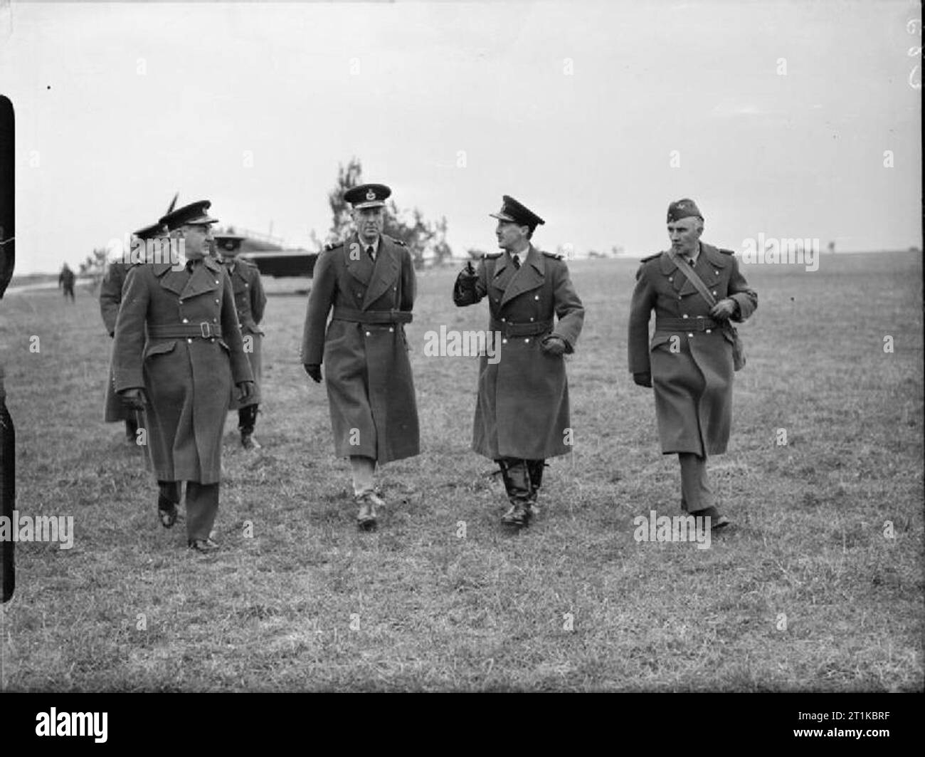 Royal Air Force- France 1939-1940. Air Chief Marshal Sir Cyril Newall, Chief of the Air Staff (third left), accompanied by Air Commodore Lord Londonderry and Air Vice Marshal P H L Playfair, Air Officer Commanding the Advanced Air Striking Force (first left), on an airfield during his tour of RAF units in France. Stock Photo