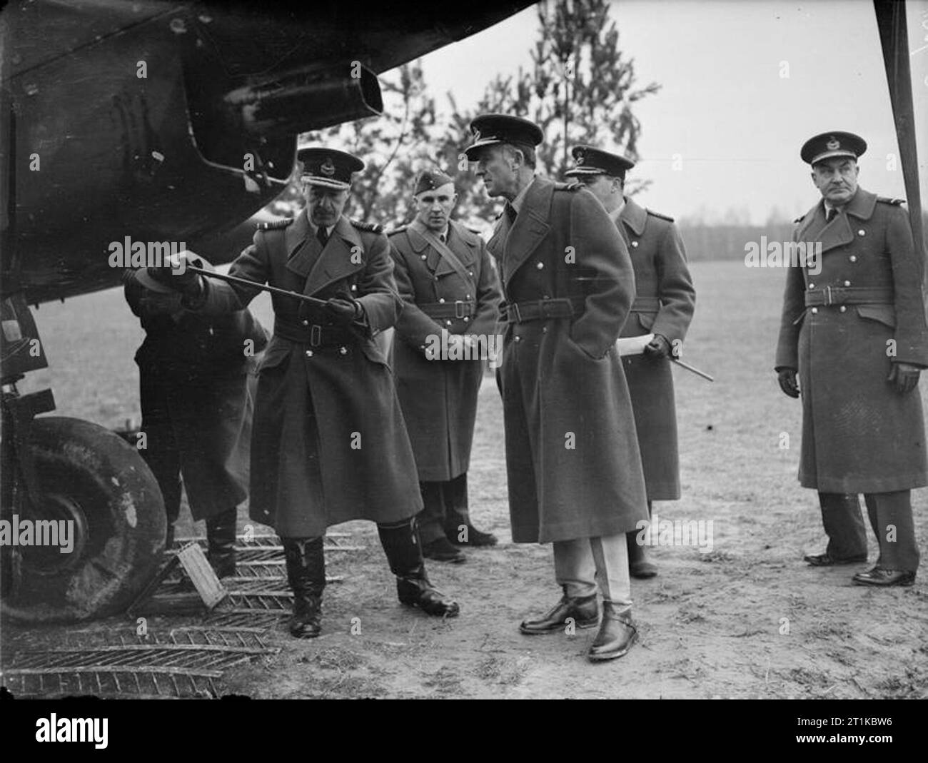 Royal Air Force- France 1939-1940. The Chief of the Air Staff, Air Chief Marshal Sir Cyril Newall (second from left), inspects a Fairey Battle at an airfield in France, accompanied by Air Commodore Lord Londonderry (fourth from left) and Air Vice Marshal P H L Playfair, Air Officer Commanding the Advanced Air Striking Force (far right). Stock Photo
