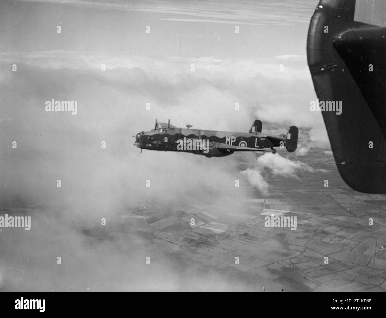 Aircraft of the Royal Air Force 1939-1945- Handley Page Hp.57 Halifax. Halifax Mark I Series 1, L9530 ?MP-L?, of No. 76 Squadron RAF based at Middleton-St-George, County Durham, in flight. Stock Photo