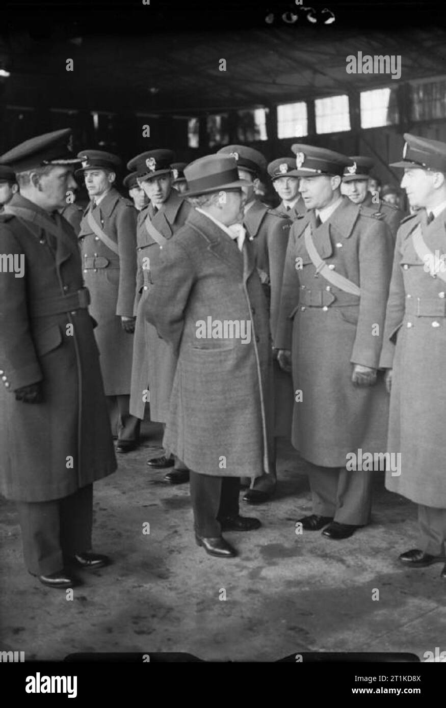The Polish Air Force in the United Kingdom, 1939-1945. The Secretary of State for War, Sir Kingsley Wood, talking with newly-arrived Polish Air Force officers in a hangar at Eastchurch, Kent, the receiving centre for PAF personnel in the United Kingdom. Stock Photo