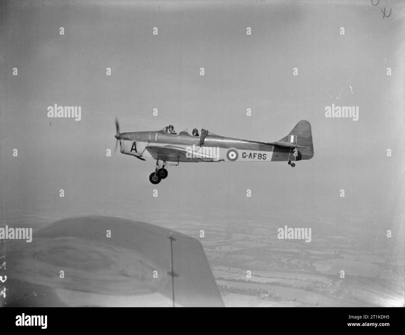 Aircraft of the Royal Air Force 1939-1945- Miles M.14 Magister. Magister, G-AFBS ?1?, of No. 8 Elementary Flying Training School based at Woodley, Berkshire, in flight. This aircraft was impressed from the civilian register and was subsequently given the Air Ministry serial number BB661. Stock Photo