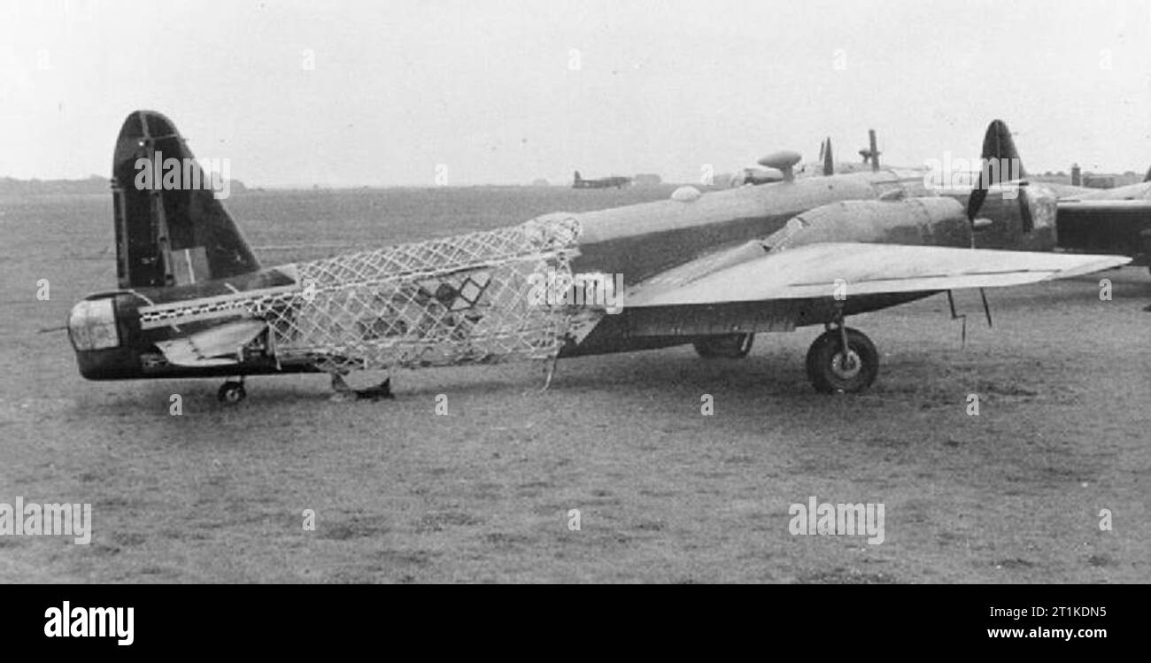 The Polish Air Force in the Air Offensive Against Germany, 1942-1945 Vickers Wellington Mark IV, Z1407 'BH-Z', 'Zo?ka', of No. 300 Polish Bomber Squadron RAF on the ground at Ingham, Lincolnshire, having lost most of its rear fuselage fabric through battle damage sustained on 4/5 September 1942 when raiding Bremen, Germany. In spite of a damaged wireless set, a badly working rudder, damaged flaps and no navigational instruments, the pilot, Pilot Officer Stanis?aw Machej, with the cooperation of his whole crew, brought the aircraft safely home. Stock Photo
