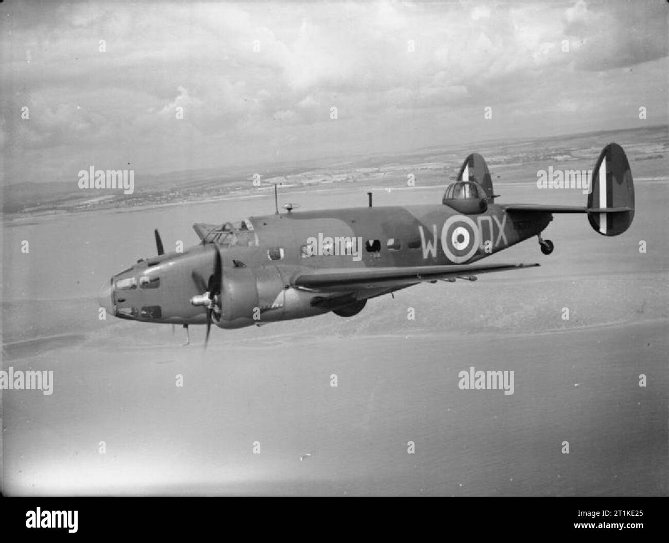 American Aircraft in RAF Service 1939-1945- Lockheed L-214 and L-414 Hudson. Hudson Mark I, T9277 ?QX-W?, of No. 224 Squadron RAF based at Leuchars, Fife, in flight off the Scottish coast. This was a late production Mark I, fitted with Hydromatic propellers and early ASV Mark 1 radar. T9277 went missing while on a patrol off Norway on 9 December 1940. Stock Photo