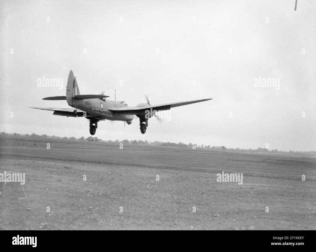 Royal Air Force Bomber Command, 1939-1941. Bristol Blenheim Mark IV, Z5899 'GB-J', of No. 105 Squadron RAF based at Watton, Norfolk, about to touch down on the main runway at Attlebridge, Norfolk, during an Army Co-operation exercise. Stock Photo