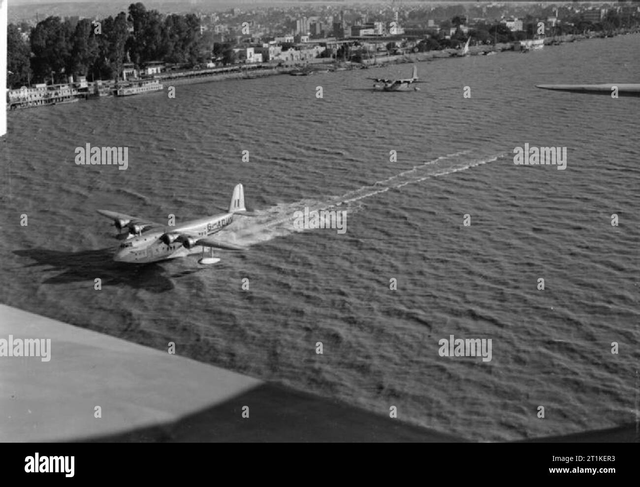 British Overseas Airways Corporation and Qantas, 1940-1945. Short S.23 'C' Class Empire Flying Boat, G-ADUV 'Cambria' of BOAC, taking off from the Nile at Rod-el-Farag flying boat base, Cairo. Stock Photo