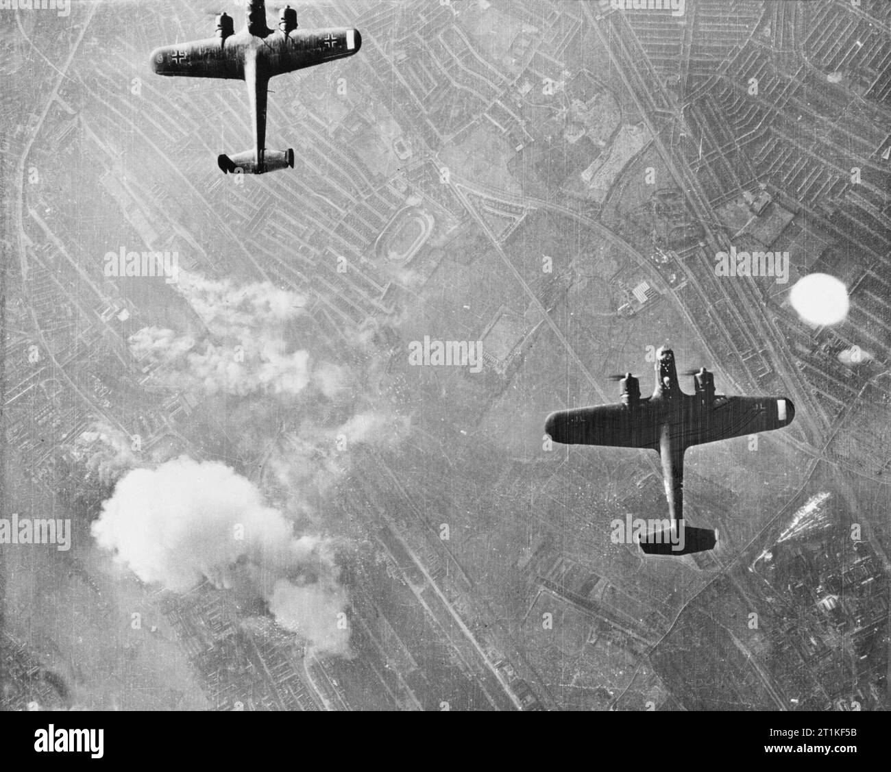 German Dornier Do 17 bombers over London, 7 September 1940. Operations: Two Dornier 17 bombers over West Ham, London. Stock Photo