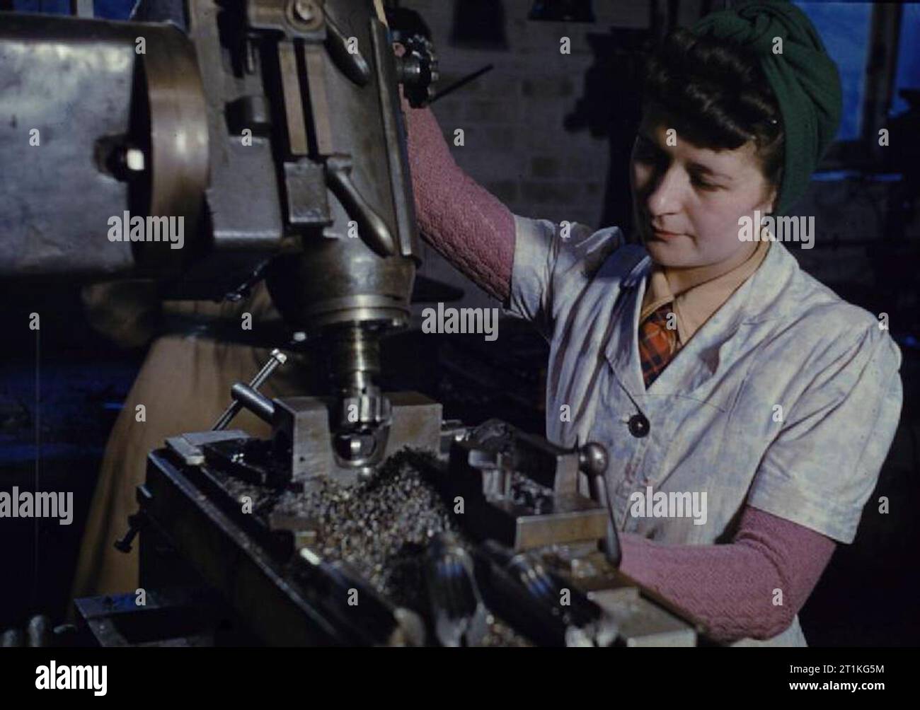 Sten Gun Production in Britain, 1943 Woman war worker milling breech ...
