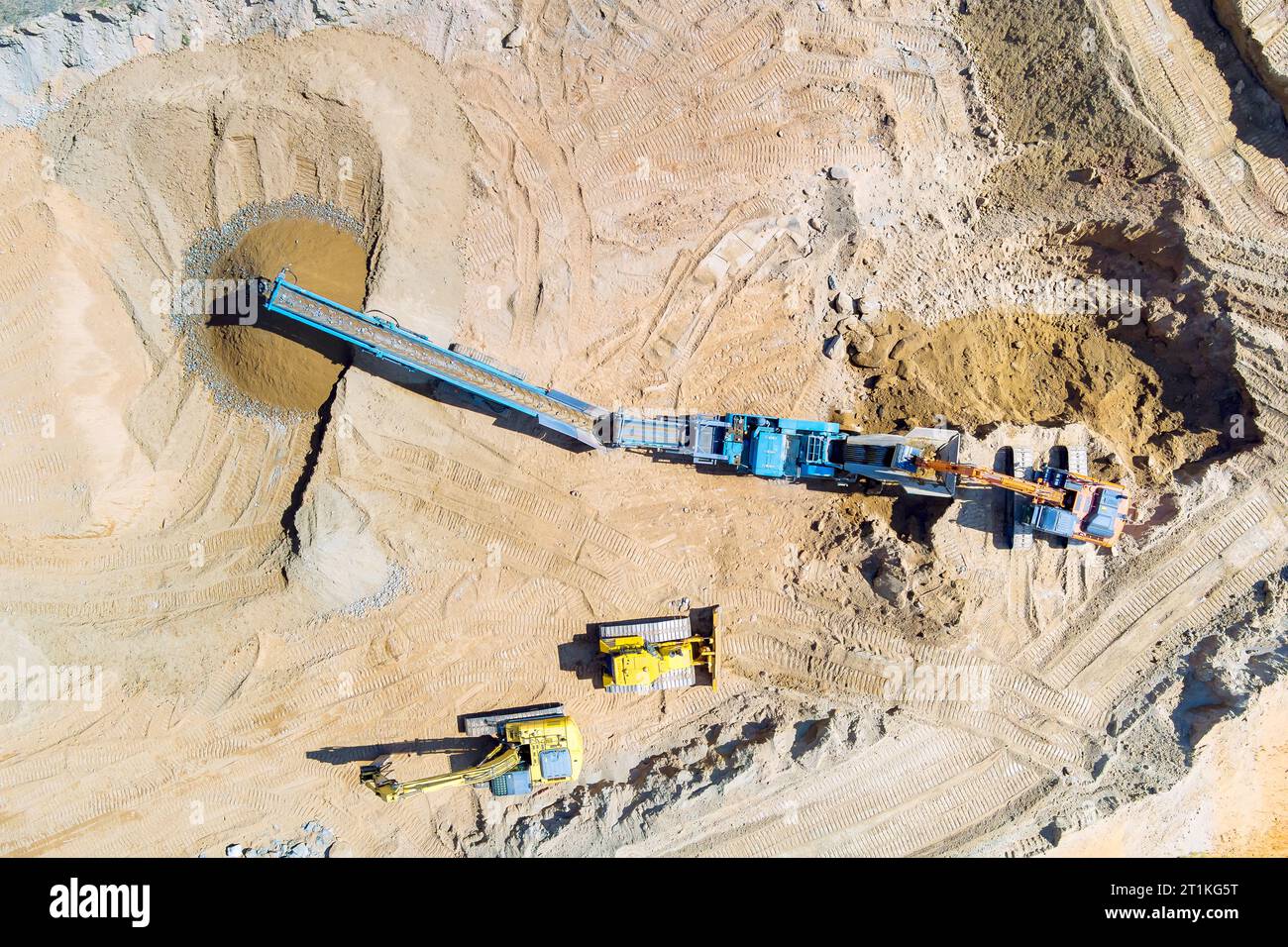 Cone Rocks Gravel quarry mining with cone rock crusher for processing crushed ...