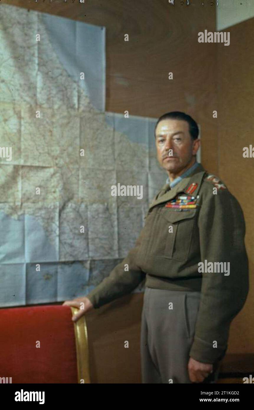 The Commander in Chief, Allied Armies in Italy, General Sir Harold Alexander, in Caserta, Italy, 4 May 1944 Three quarter length portrait of General Sir Harold Alexander, GCB, KCB, CB, CSI, DSO, MC, standing in front of a map of Italy at his headquarters in Caserta. Stock Photo