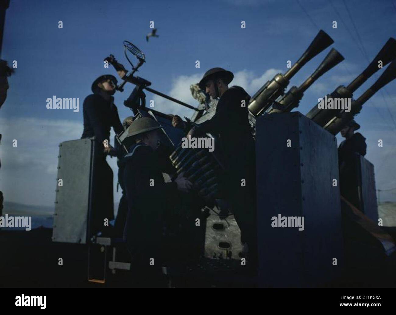 The Royal Navy November 1943 A 4 Barrel Pom pom Gun And Crew Stock 