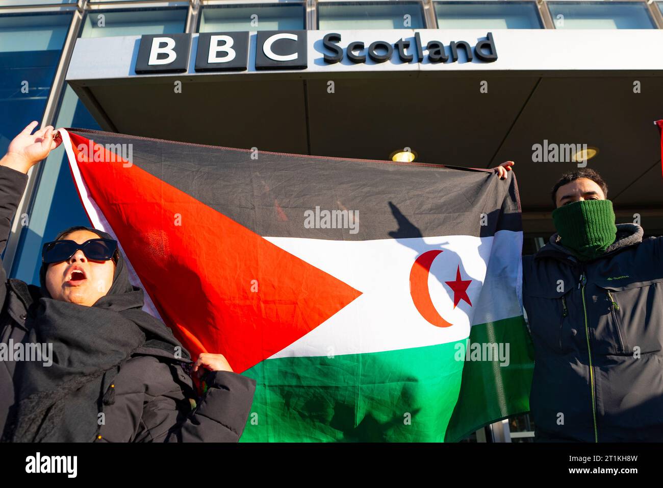 Glasgow, Scotland, UK. 14th October 2023.  Supporters of Palestine attend a rally and demonstration in Glasgow at the Buchanan  street steps today. They were protesting against the severe retaliation by Israel against Gaza following the Hamas attack  on Israel last week. After the rally the protesters marched through the city centre to the BBC studios at Pacific Quay where a rally against the BBC was held. Iain Masterton/Alamy Live News Stock Photo