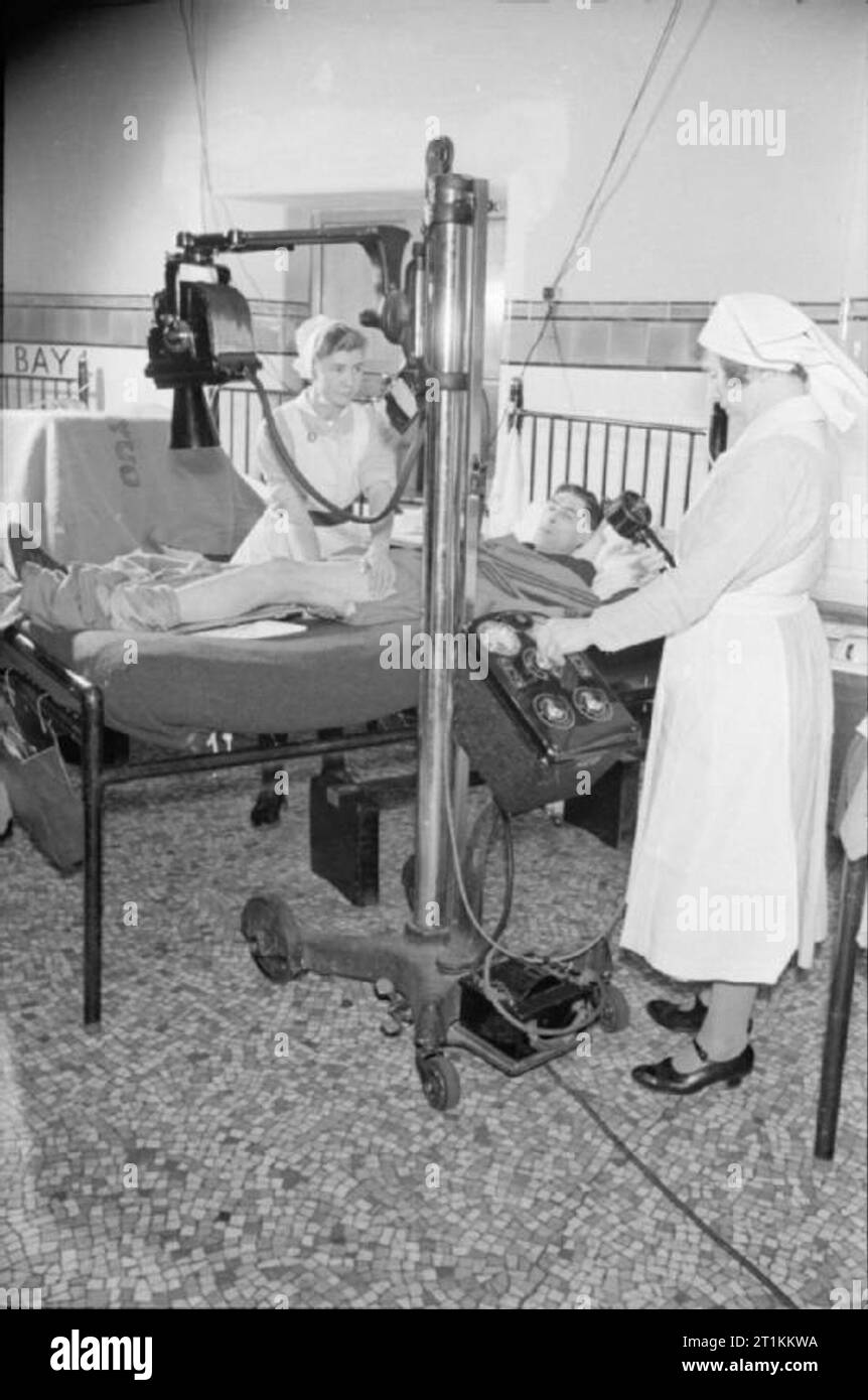 Guy's Hospital Life in a London Hospital, England, 1941 Two nurses use
