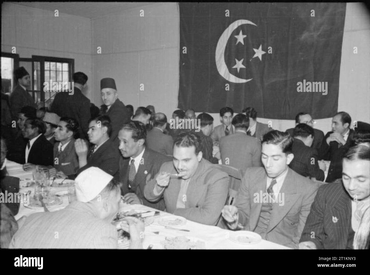 Muslims in Britain Eid Ul Fitr Celebrations, 1941 A view of men enjoying a feast following the