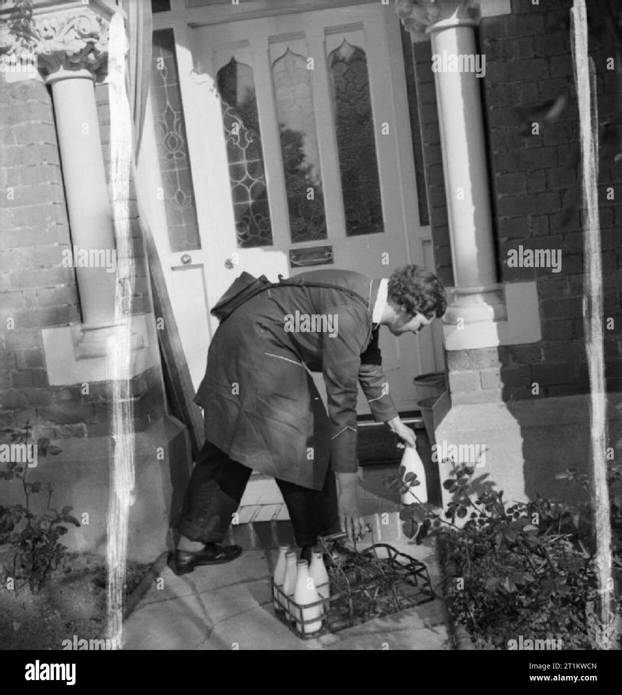 Women Deliver the Milk in Wartime Britain, 1942 A female milkman leaves