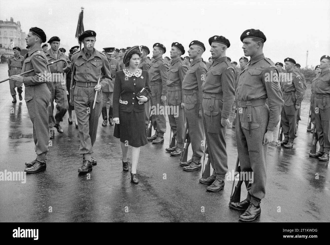 Allied Preparations For D-day Princess Elizabeth inspecting an honour guard during a Royal visit to 2nd (Armoured) Battalion Grenadier Guards, 5th Guards Armoured Brigade, Guards Armoured Division, at Hove, 17 May 1944. Stock Photo