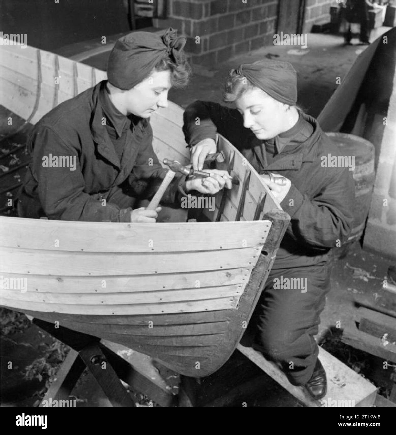 Women's Royal Naval Service Wrens work on Assault Landing Craft, UK