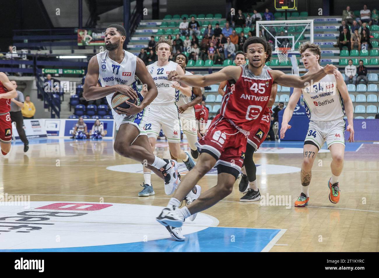 Mons, Belgium. 14th Oct, 2023. Mons' Kyle Castlin and Antwerp's Rasir