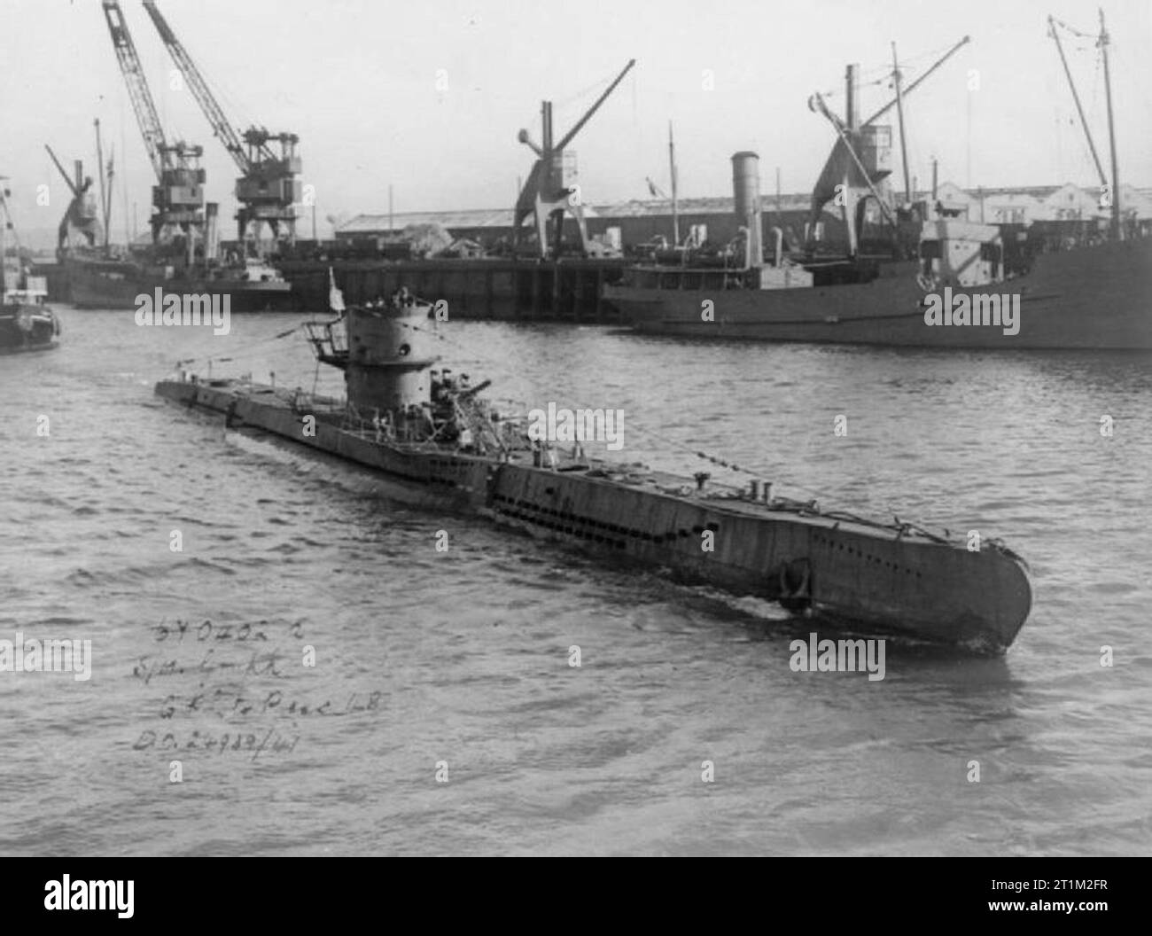 The German UBoat U570 enters dock at BarrowinFurness after her