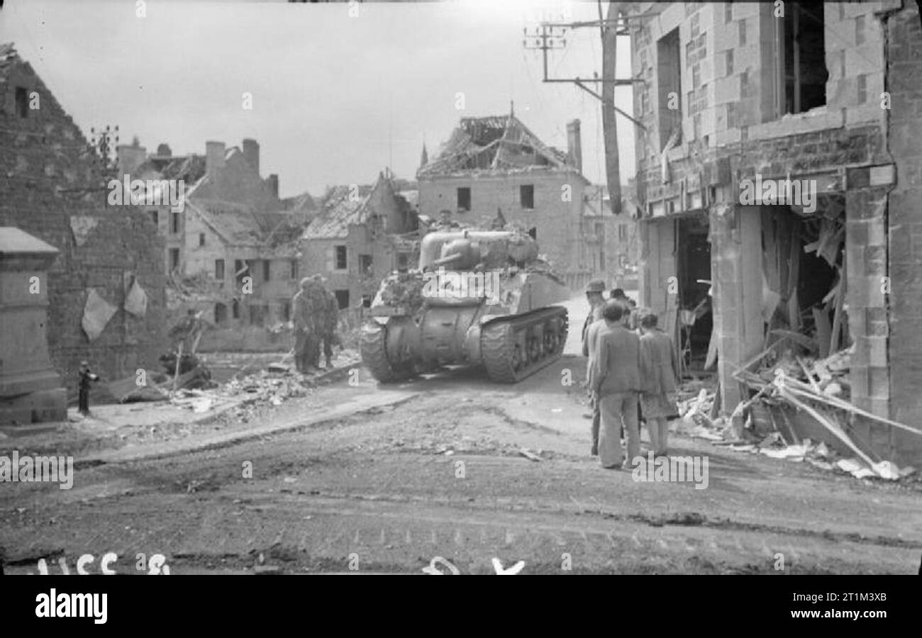 The British Army in Normandy 1944 A Sherman tank crossing the newly ...