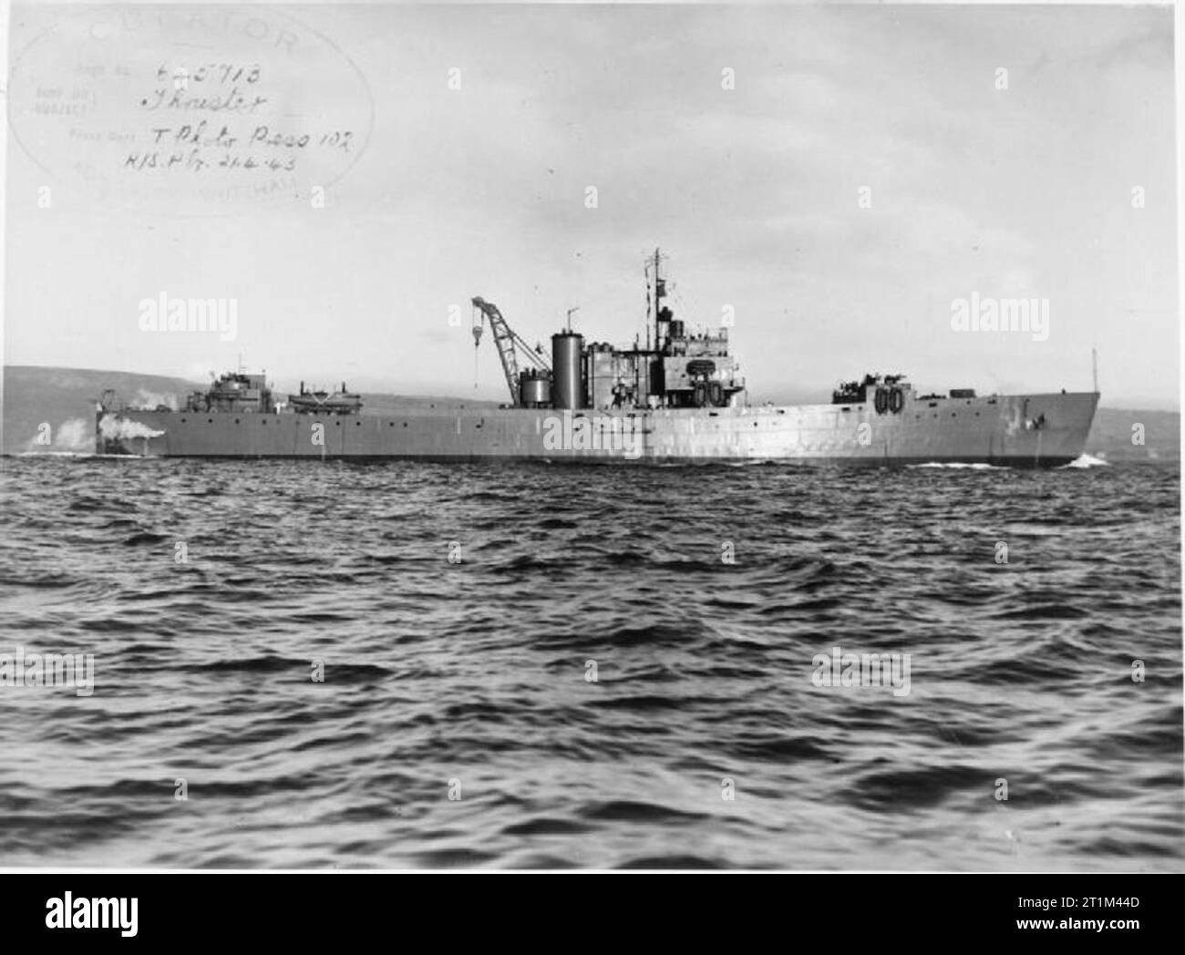 HMLST Thruster, a flatbottomed landing craft, underway at sea Stock