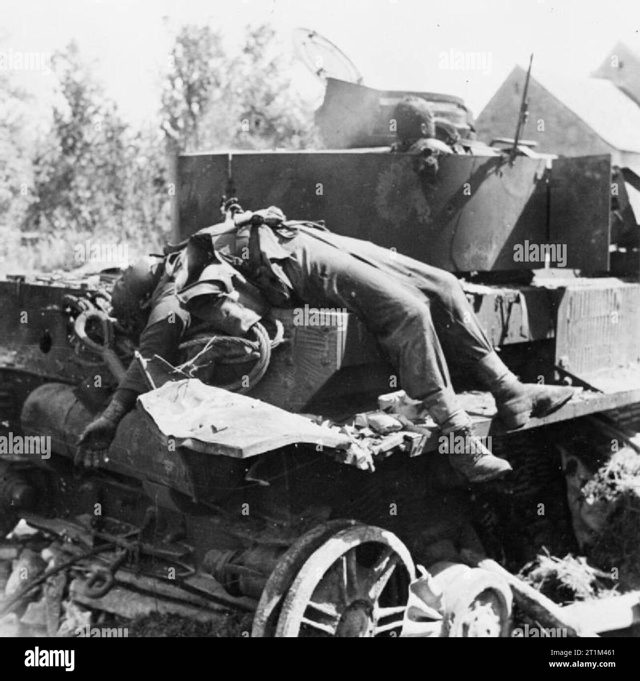 The British Army in Normandy 1944 A knocked-out German PzKpfw IV tank with the burnt bodies of two of its crew in the Falaise pocket, 24 August 1944. Stock Photo