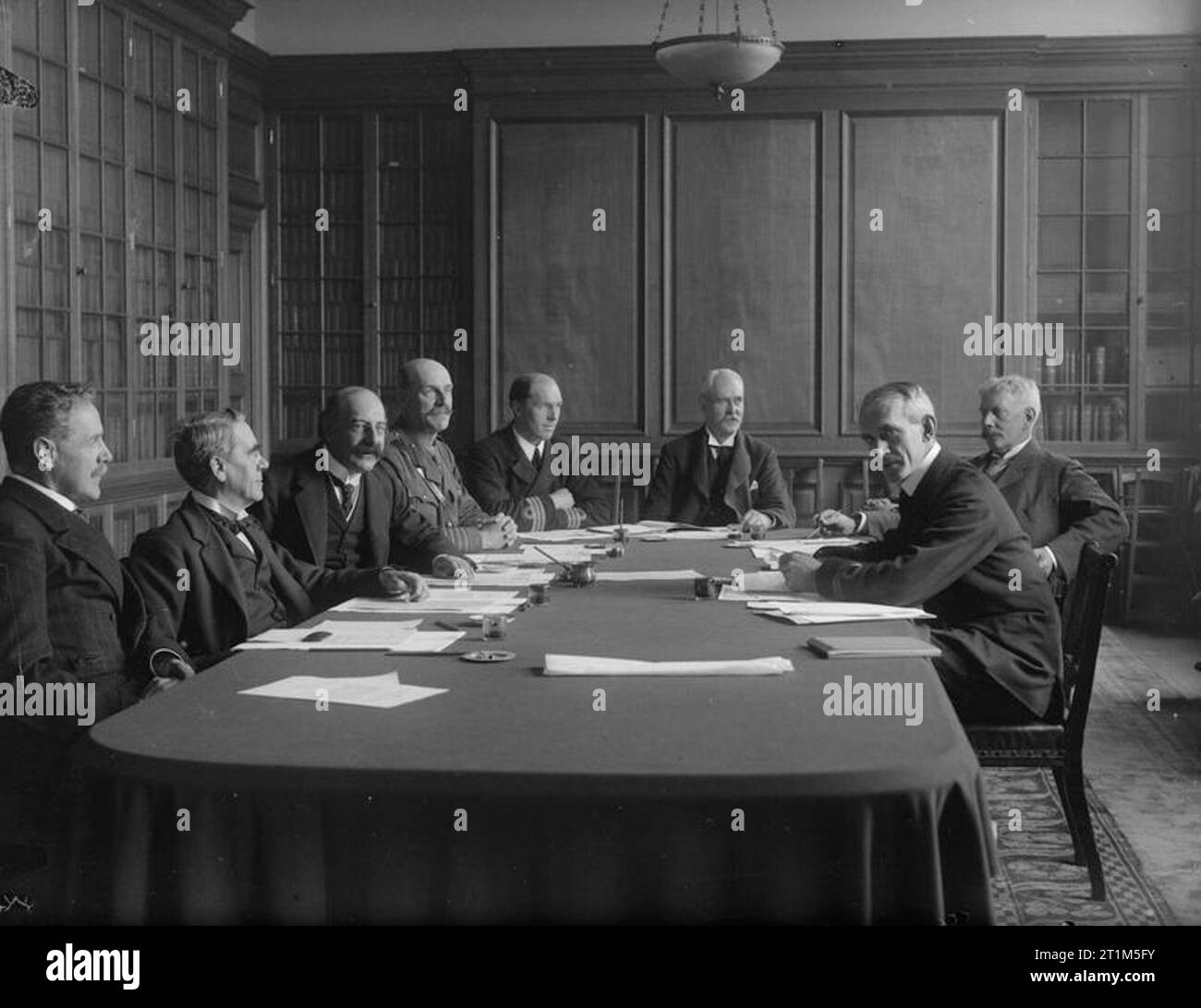 Ministry of Information First World War Official Collection Committee of the Imperial War Museum 1918-1919. left to Right: Ian Malcolm, Esq, M.P., Sir Martin Conway M.P., F.S.A, Rt. Hon. Sir Alfred Mond, P.C., M.P., Col. J.R. Stansfield, C.B., Capt. C.C. Walcott, R.M., B.B. Cubitt Esq., C.B., C.W. Oman Esq, M.P., Major Charles Ffoulkes R.M., F.S.A. Stock Photo